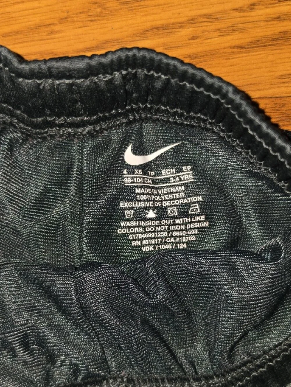 Nike Black Mesh Kids Athletic Shorts with White Swoosh